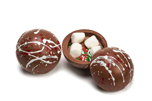 Bombe de chocolat chaud de noel spécialement fabriqué pour le temps des fêtes par la chocolaterie en ligne québécoise la praliniere. Parfait pour remplir les bas de Noel.