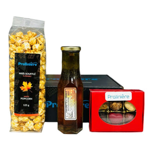 Boite cadeau en ligne contenant chocolat, popcorn et vinaigrette à l'érable