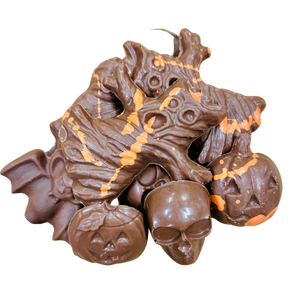 Bouchées de chocolat au lait aux formes de monstres, sorcieres et citrouille pour Halloween
