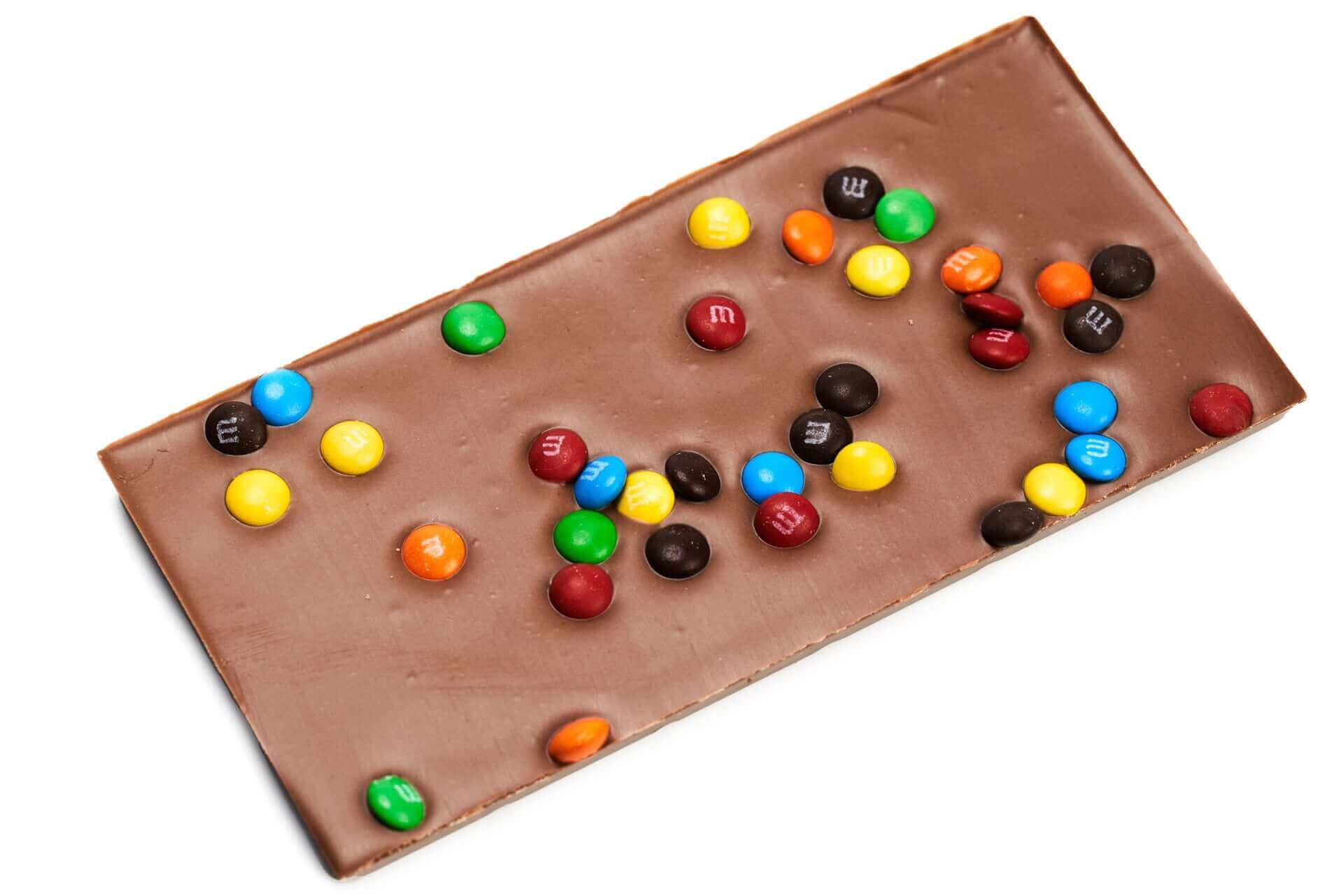 Symbole Chocolat Fabriqué à Partir De Barres Diagonales Lettre M